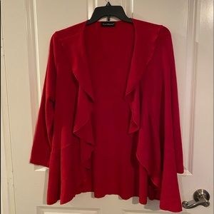 Red sweater by Travel Elements